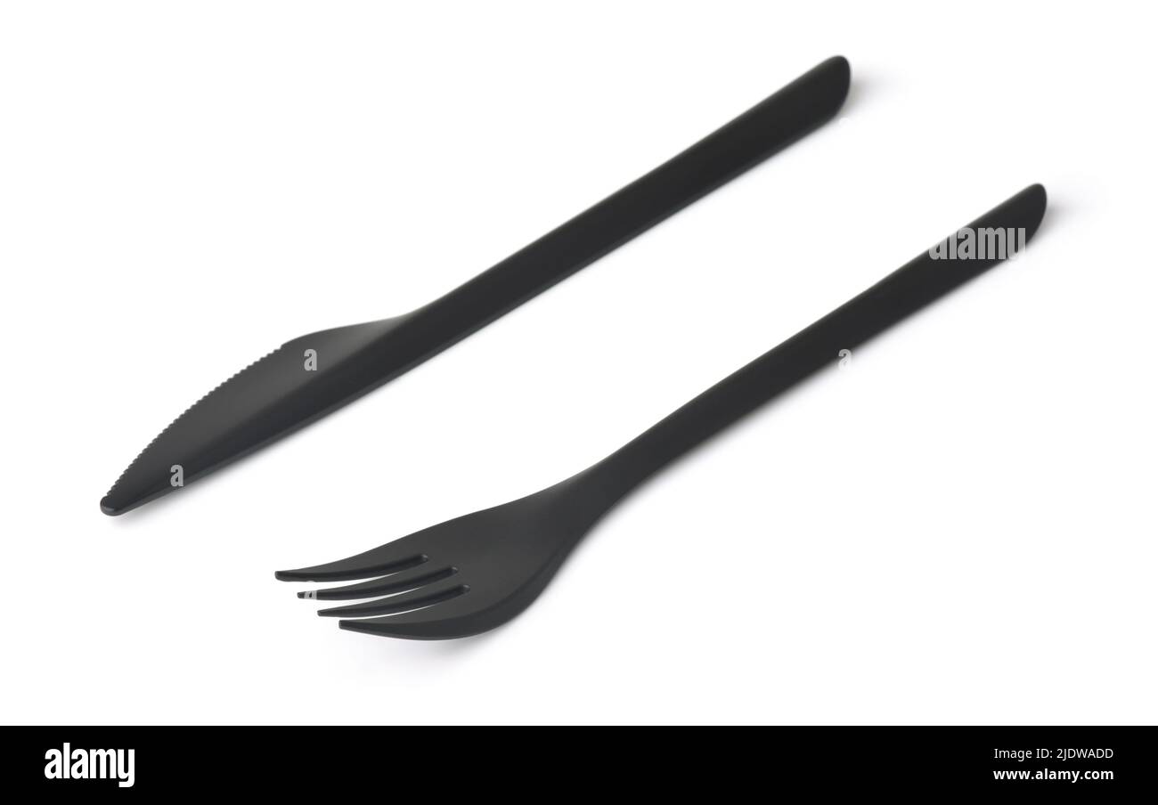 Forcella e coltello monouso in plastica nera isolati su bianco Foto Stock