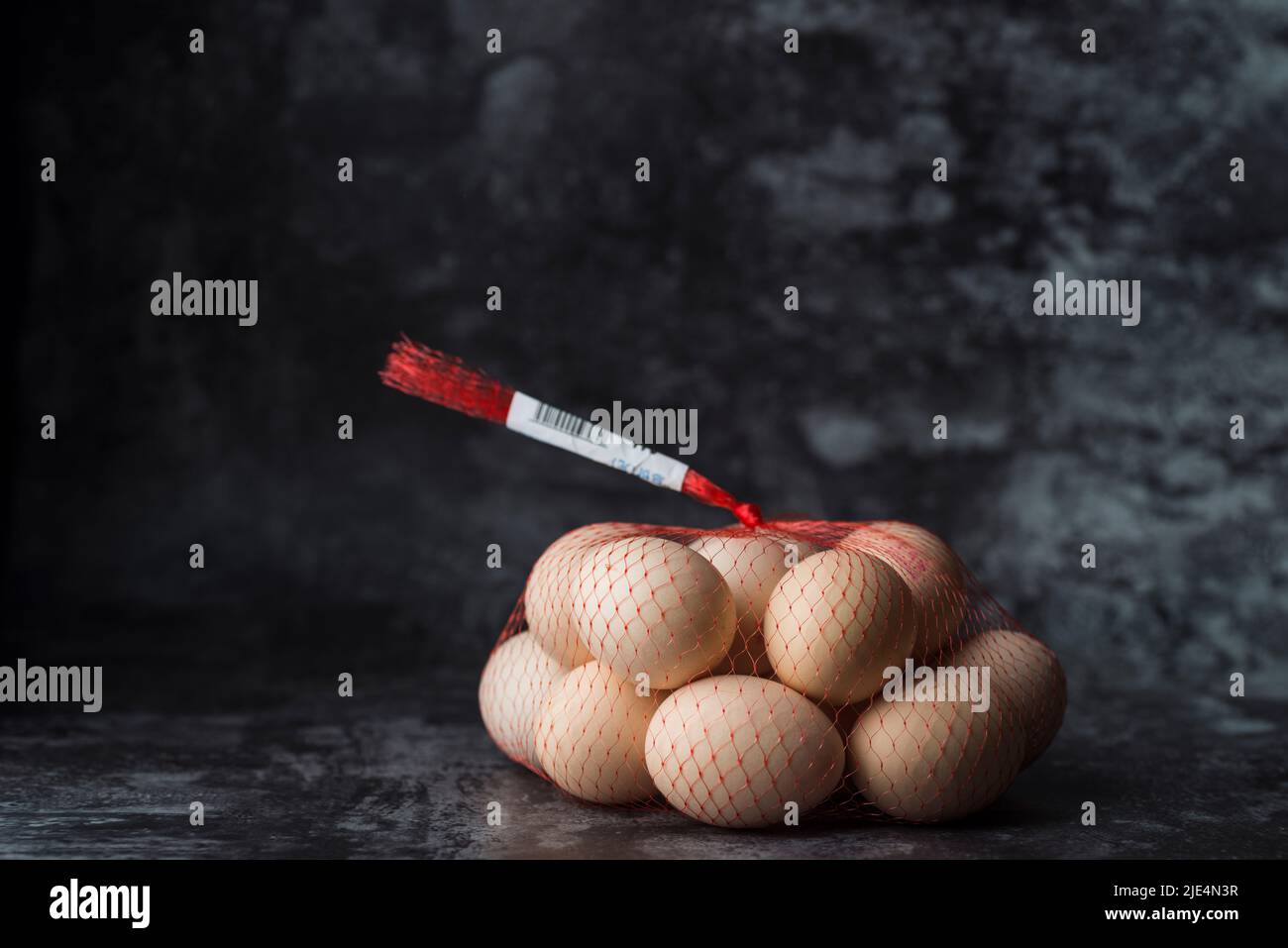 Sacchetti di rete di plastica in uova di terreno uniformi Foto Stock