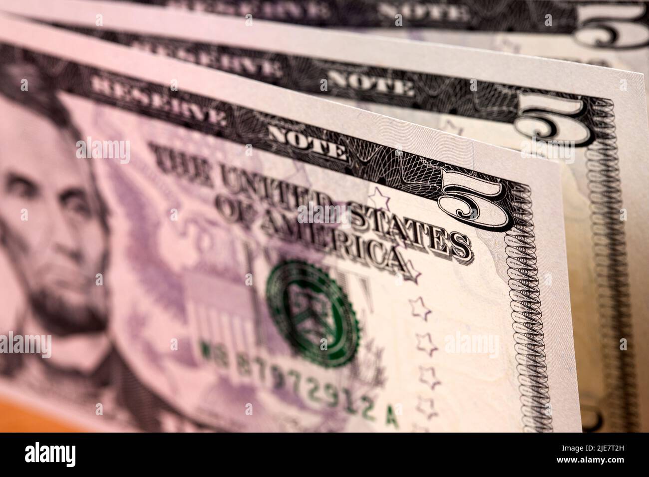 Soldi americani - 5 dollari un background di affari Foto Stock