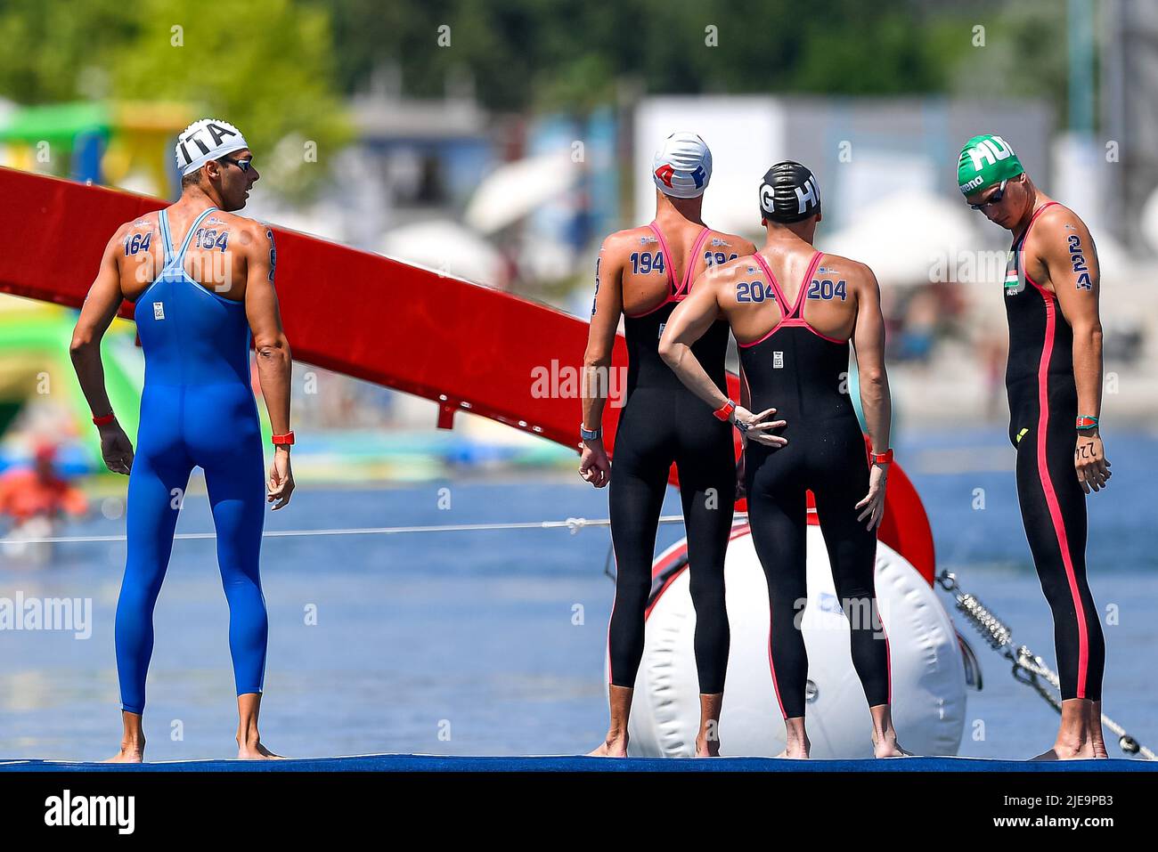 Budapest, Ungheria. 26th giugno 2022. Team Italy PALTRINIERI Gregorio ITA, Team France OLIVIER Marc-Antoine, Team Hong Kong SIN Chin Ting Keith HKG, Team Hungary RASOVSZKY Kristof HUN4x1500m Mixed Relay Final Open Water Swimming FINA 19th World Championships Budapest 2022 Budapest, Lupa Lake 26/06/22 Foto Andrea Masini/Deepbluemeoto/Live News srl Alinsidefoto/Credit Aldefamy News Foto Stock