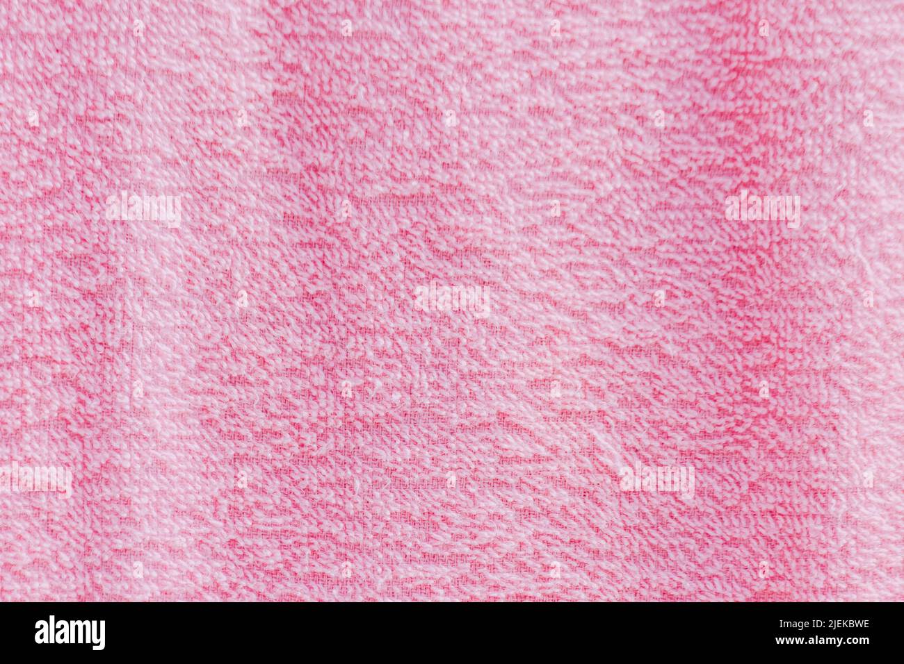 Le texture e i dettagli del tappeto rosa. Utilizzato come immagine di sfondo e come decorazione interna. Foto Stock