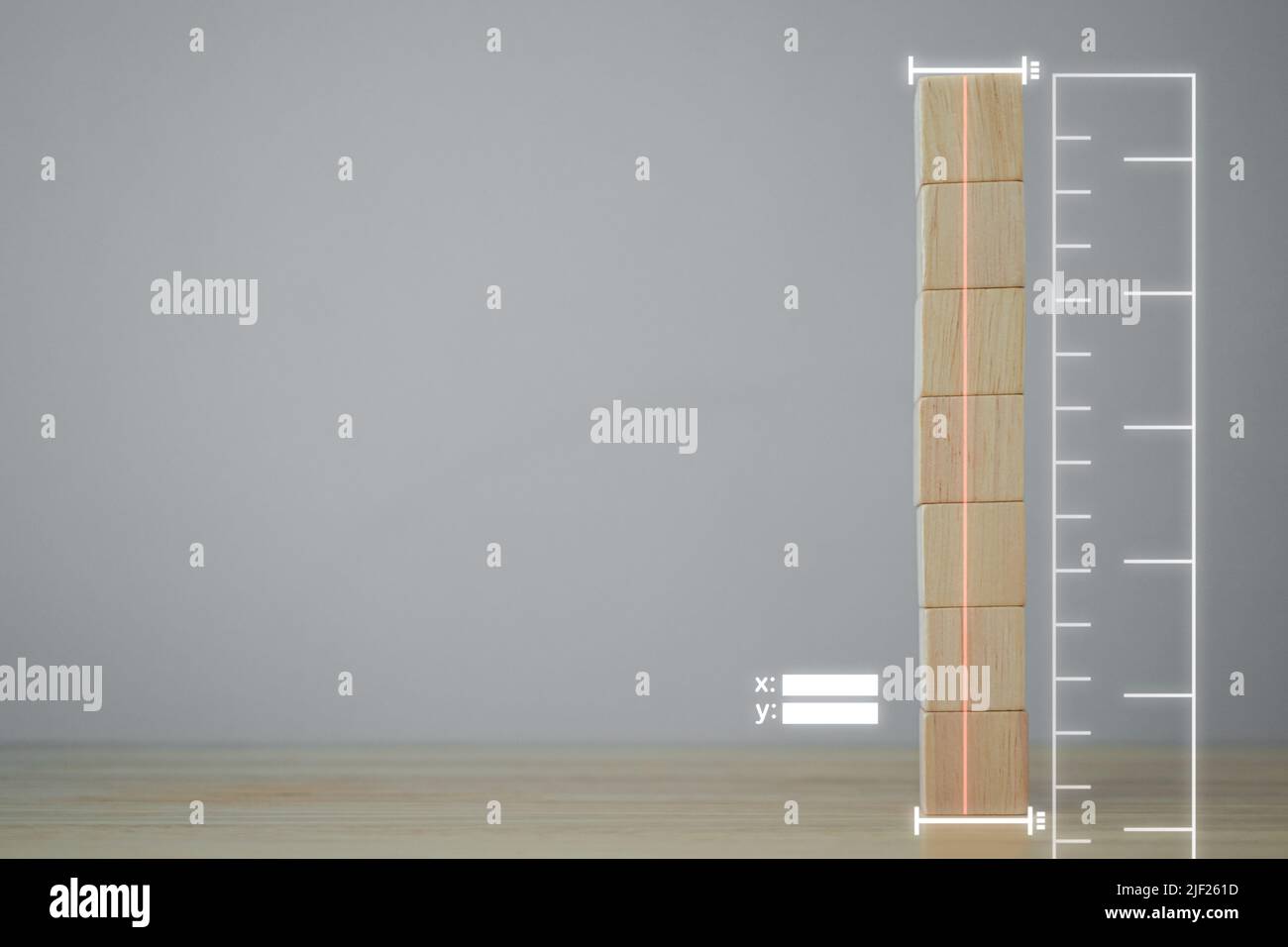 Concetto di misurazione. Questa immagine mostra come utilizzare l'applicazione di misurazione. Trova la dimensione di blocco di legno che ha disposto in verticale. Foto Stock