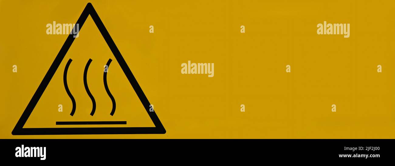 Attenzione simbolo di avvertenza superficie calda. Nessun testo. Foto Stock