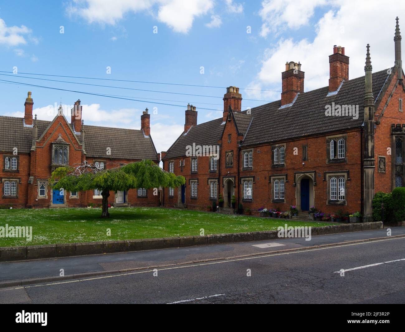 Gli almshouses sono stati fondati e dotati da Sir John Gamlyn in 1590 per ventidue poveri della parrocchia di Spalding Lincolnshire Inghilterra Regno Unito Foto Stock