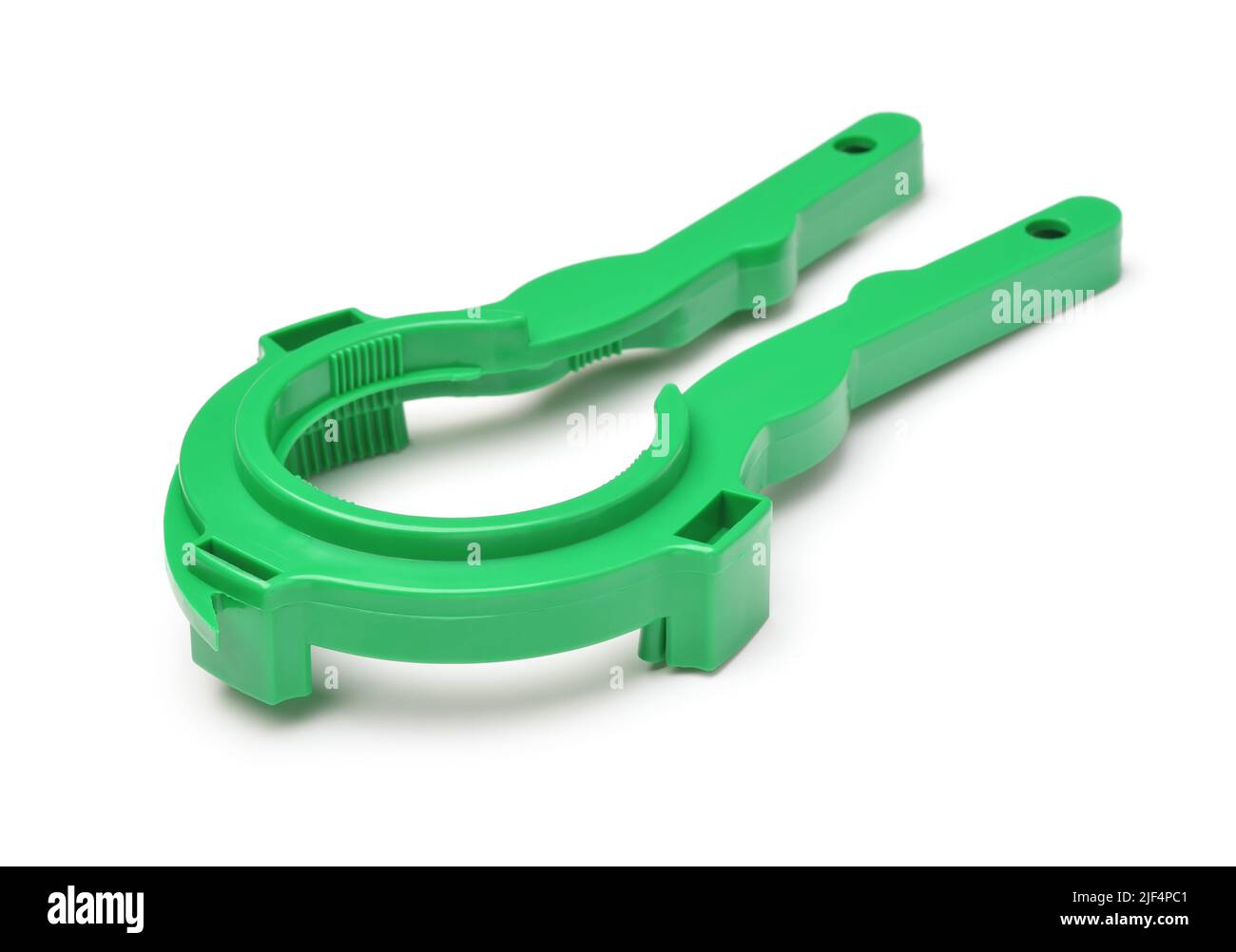 Dispositivo di apertura del coperchio del vaso di plastica verde isolato su bianco Foto Stock