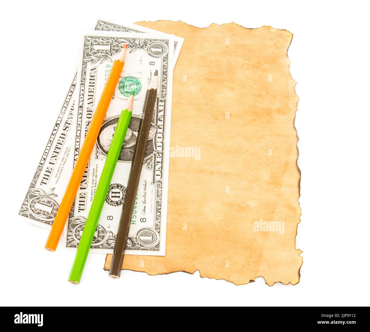 Banconote in dollari e matita colorata su vecchio sfondo cartaceo Foto Stock