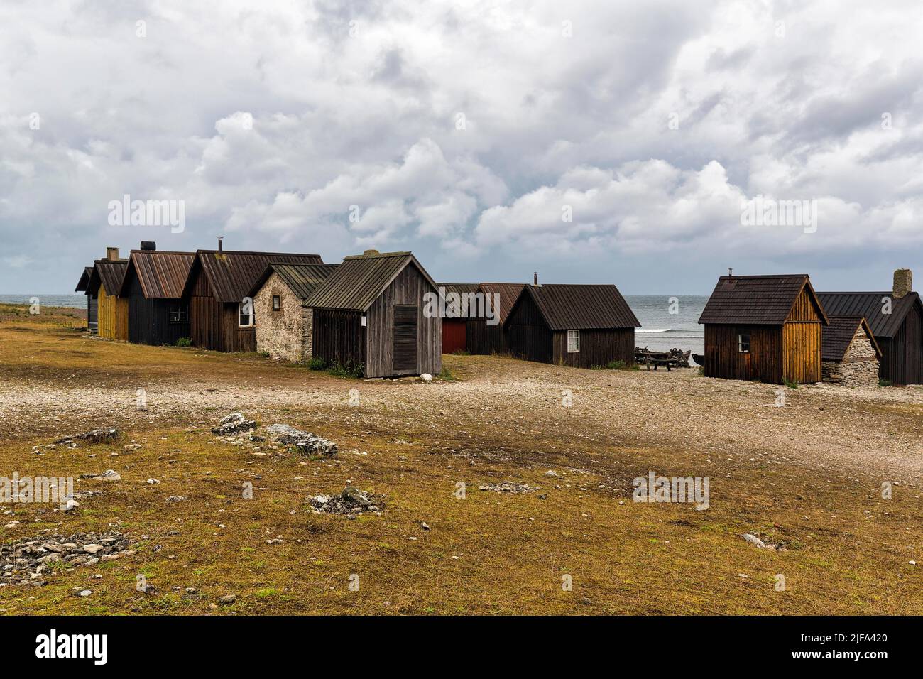 Vecchie capanne da pesca, luogo di pesca tradizionale, villaggio di pescatori, Helgumannen Fiskelaege, isola di Faroe, Faroe, Gotland, Mar Baltico, Svezia Foto Stock