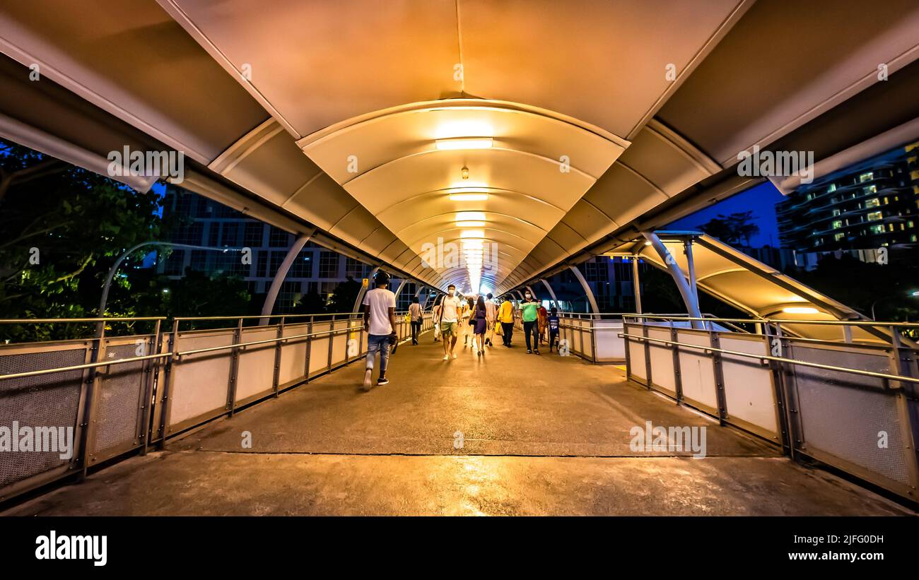 Ponte sospeso che collega Jem all'ospedale ng Teng Fong. Foto Stock