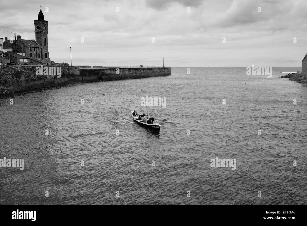 Addestramento di Rowing di Gig a Porthleven, Cornovaglia Foto Stock