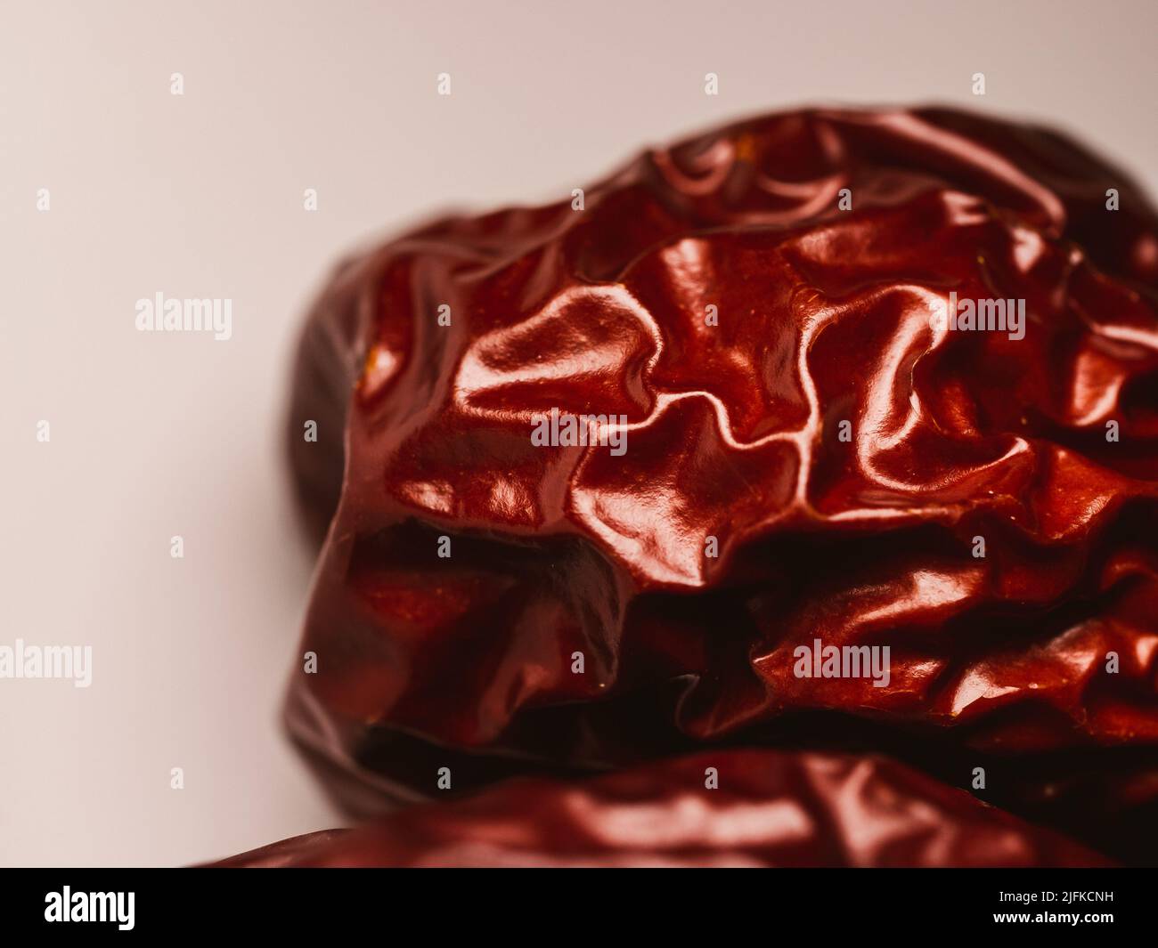 Primo piano di un succo di frutta secco. Il jubo cinese, detto anche red date, è una specie del genere Ziziphus. Foto Stock