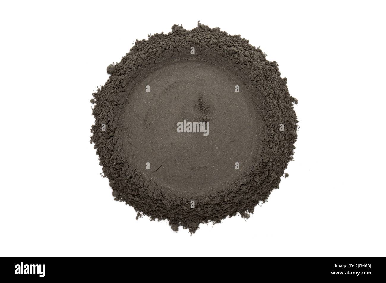 Cerchio nero polvere cosmetica di argilla - vista dall'alto Foto Stock