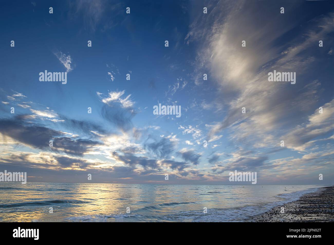 Ault Onival, plage au coucher de soleil. Foto Stock