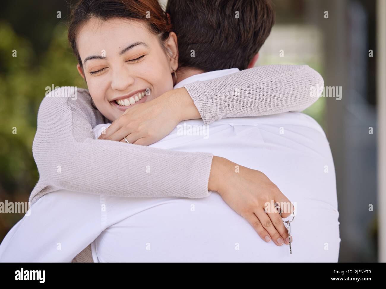 Malati essere sempre lì per mostrarti la strada. Scatto di una coppia che si lega sul portico a casa. Foto Stock