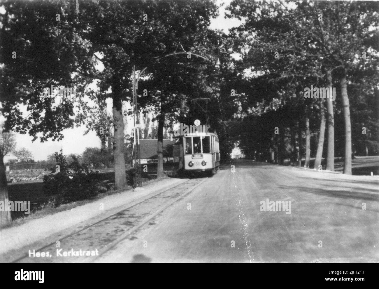 Visto in direzione di Korte Bredestraat, con il tram elettrico sulla strada per la sua stazione finale De Witte Poort nel mezzo Foto Stock