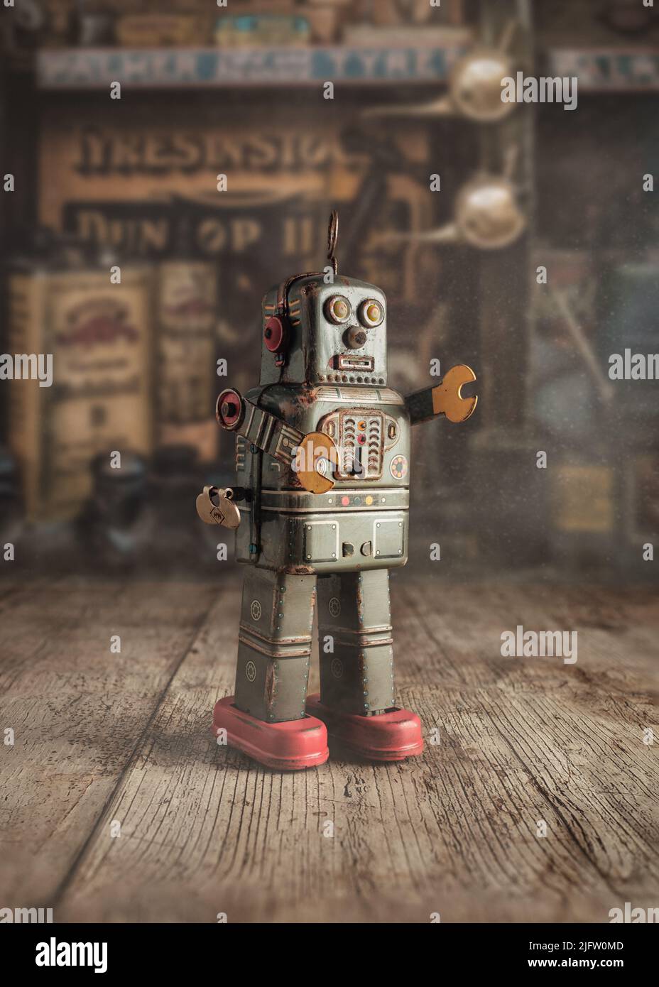 Un robot giocattolo d'epoca, retrò, con orologio Foto Stock