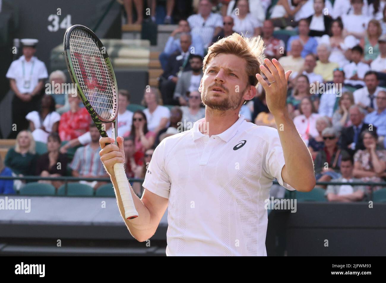 Wimbledon, UK, 05/07/2022, il belga David Goffin reagisce durante una partita di tennis contro la Norrie britannica nelle 1/8 finali del torneo maschile di tennis singolo al torneo di tennis Wimbledon Grand Slam del 2022 presso l'All England Tennis Club, nel sud-ovest di Londra, in Gran Bretagna, martedì 05 luglio 2022. BELGA PHOTO BENOIT DOPPAGNE Foto Stock