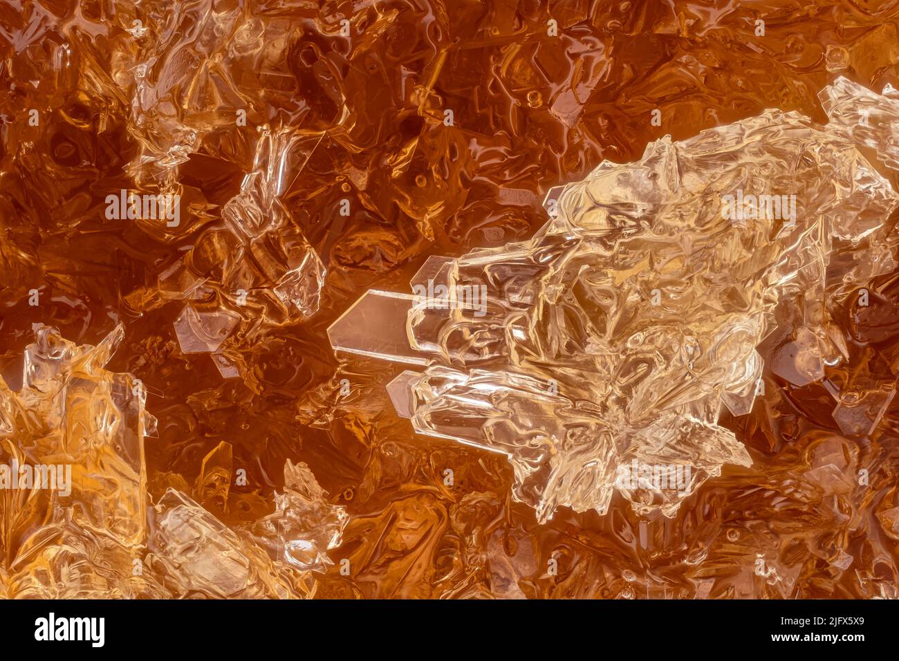 Miele cristallizzato (lychee africano), cristalli bianchi che formano forme regolari. Foto al microscopio, larghezza immagine 9mm Foto Stock