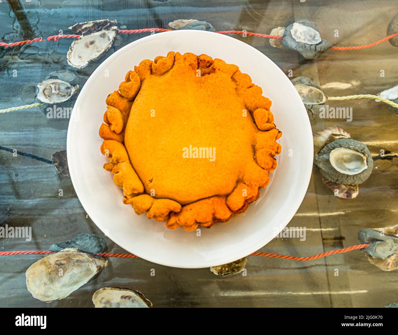 La Tielle sétoise, il pâté con calamari piccanti è una specialità tipica di Sète in Francia Foto Stock