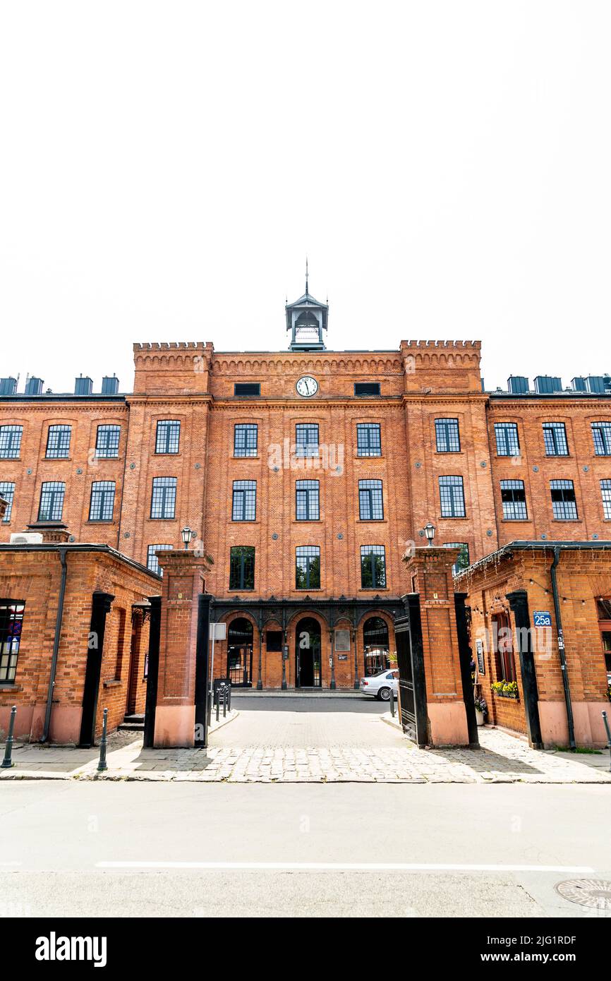 L'esterno del Cotton Mill (Dawna Przędzalnia zakładów K. W. Scheiblera) di Karol Scheibler di fine 19th secolo, ora trasformato in appartamenti, Lodz, Polonia Foto Stock