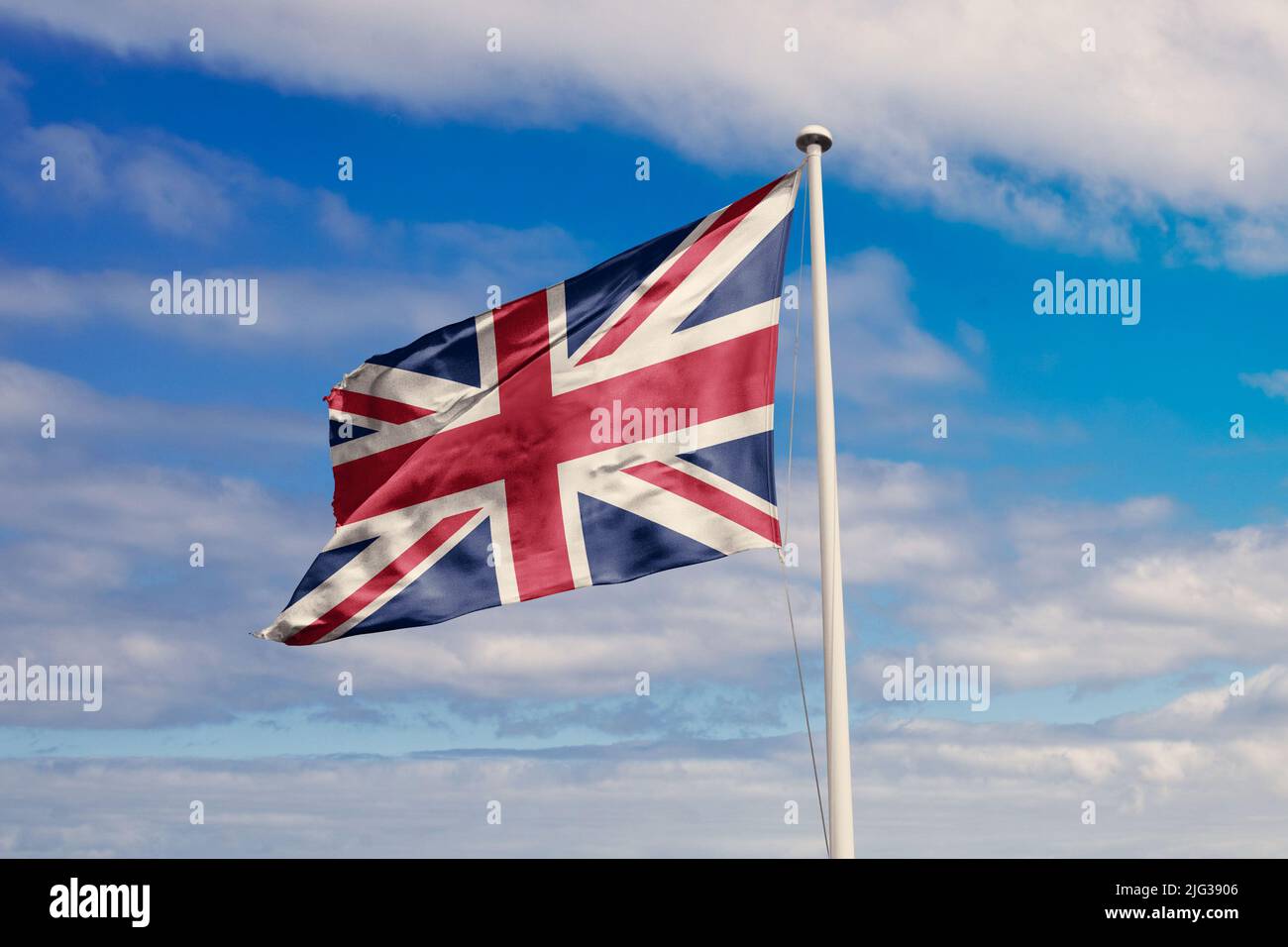 Sventolare la bandiera del Regno Unito. Immagine di una bandiera di un paese europeo su un flagpole con bandiera rossa e bianca colors.uk Foto Stock