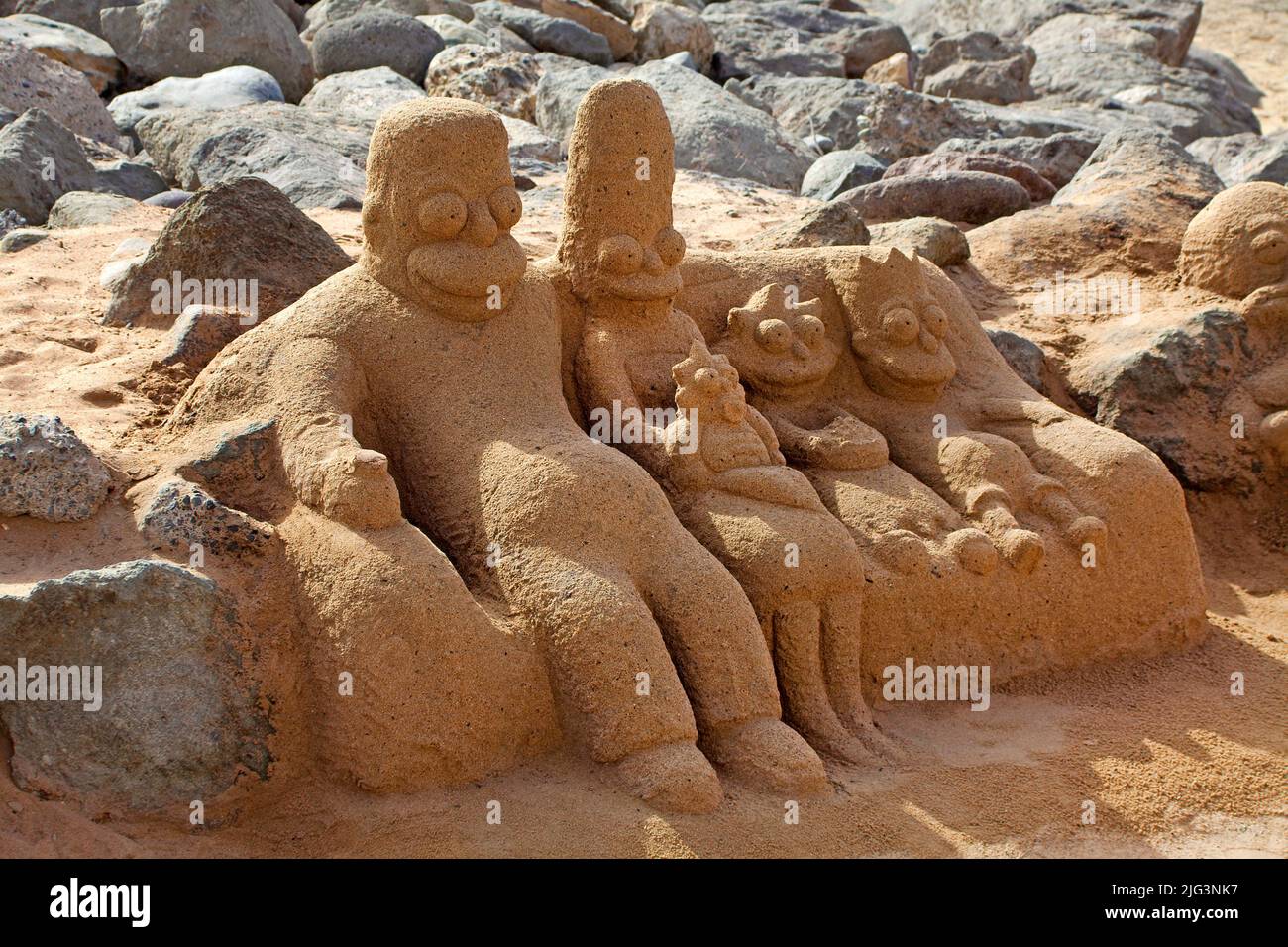 Arte della sabbia, Simpsons fatto di sabbia, spiaggia di Maspalomas, Grand Canary, isole Canarie, Spagna, Europa Foto Stock