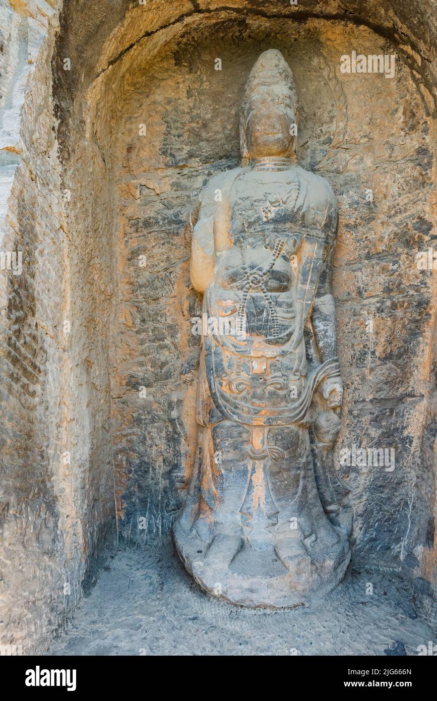 Statue scolpite delle Grotte Longmen (Grotte Longmen). Il complesso è stato iscritto come patrimonio mondiale dell'UNESCO. Foto Stock