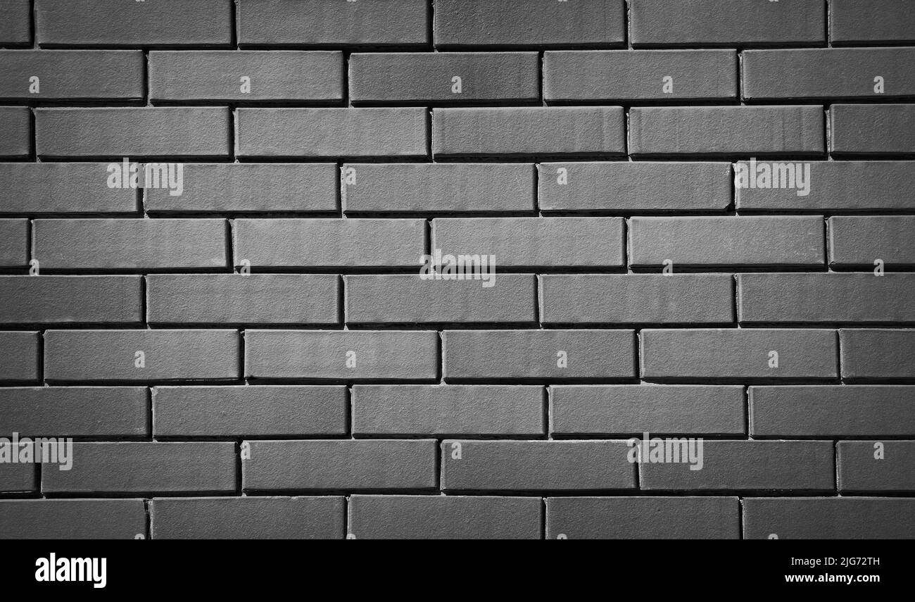 Vecchia struttura della parete del mattone grigio, struttura della parete del mattone per la tonalità vintage di disegno dell'interno Foto Stock