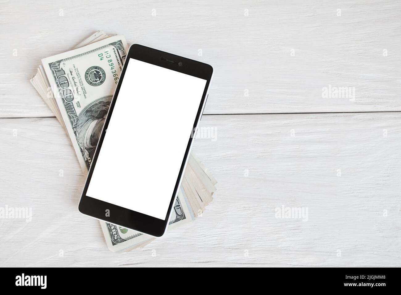 Smartphone su dollari americani, spazio libero Foto Stock