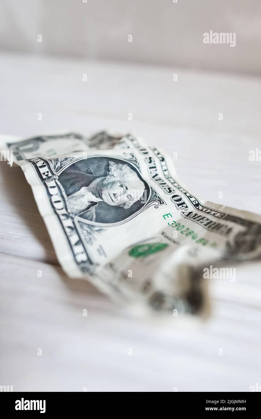 Usurato sbriciolato un dollaro fattura, sfocato, primo piano Foto Stock