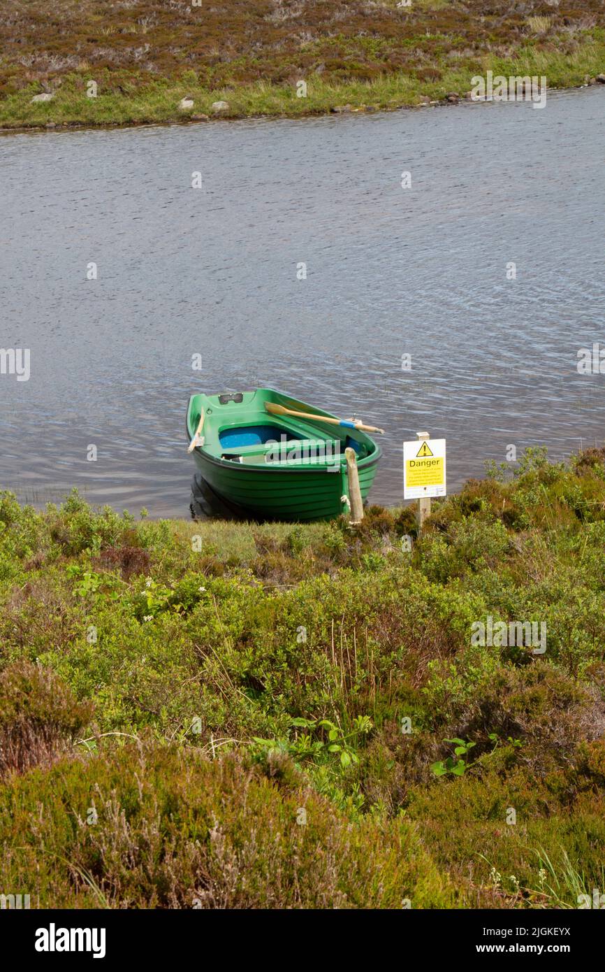 Barca a remi a Loch Druidibeag, South Uist, Ebridi esterne Foto Stock