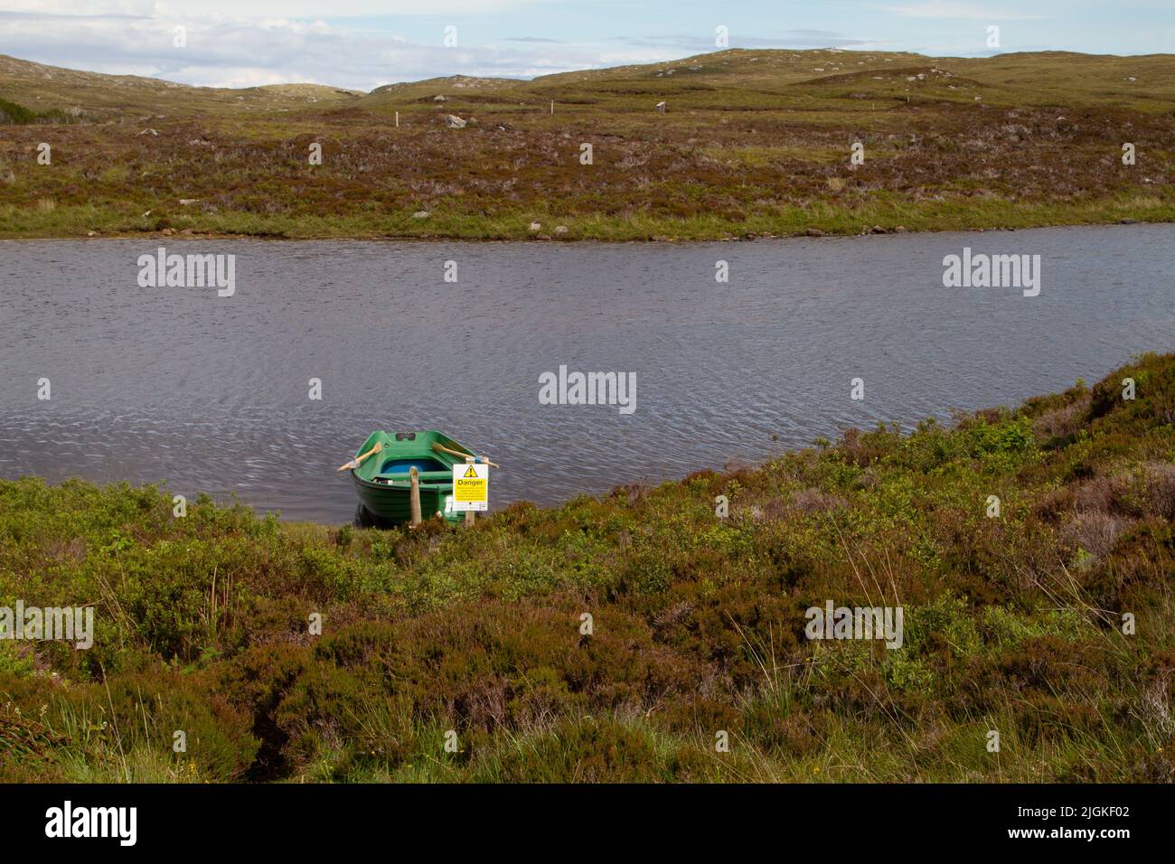 Barca a remi a Loch Druidibeag, South Uist, Ebridi esterne Foto Stock