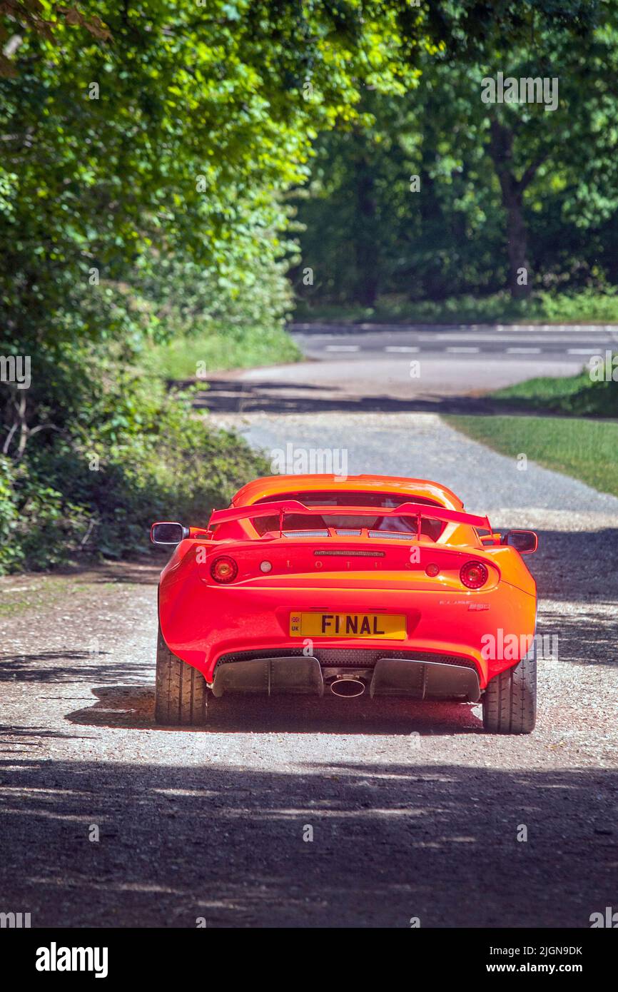 La finale Lotus Elise 250 Cup dipinta di giorno arancione brillante. Foto Stock