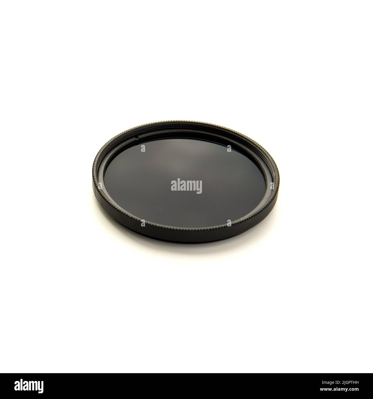 Filtro a densità neutra ND per fotocamere DSLR e mirrorless. Foto da primo piano isolata su sfondo bianco. Foto Stock