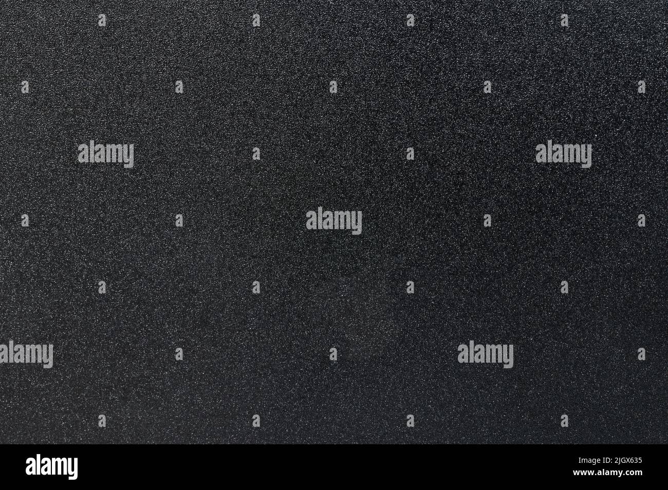Vista ravvicinata macro superficie in metallo opaco scuro Foto Stock