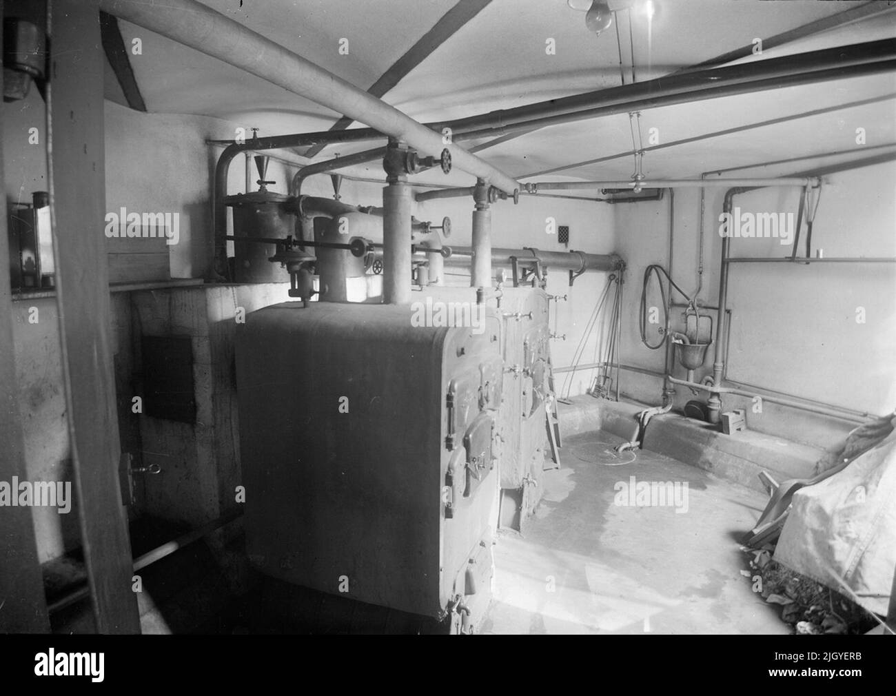 Il locale caldaia nel seminterrato, Sprit Trade Company, Uppsala 1909. Il locale caldaia nel seminterrato, Sprit Trade Company, Uppsala 1909 Foto Stock