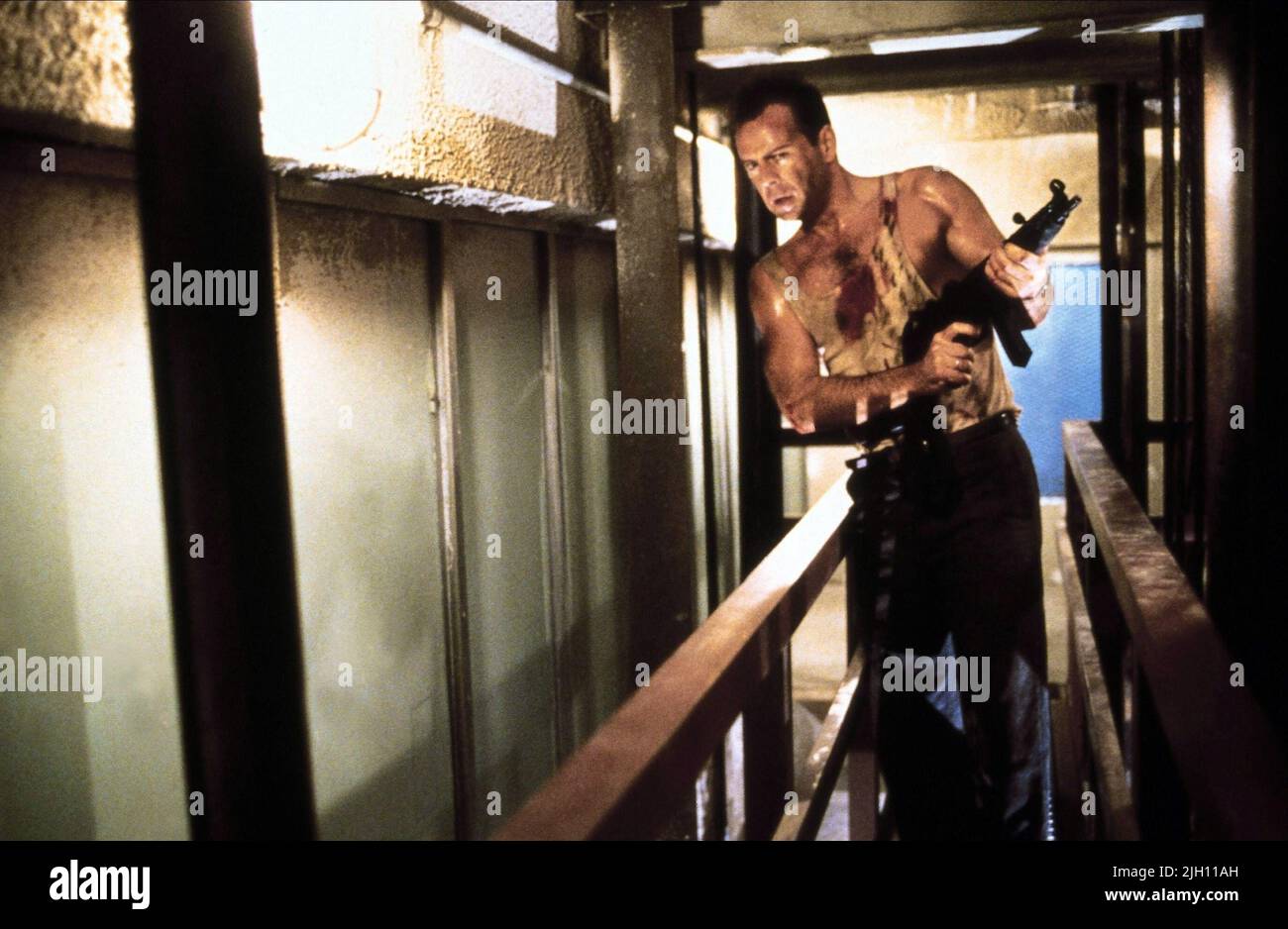 BRUCE WILLIS, DIE HARD, 1988 Foto Stock