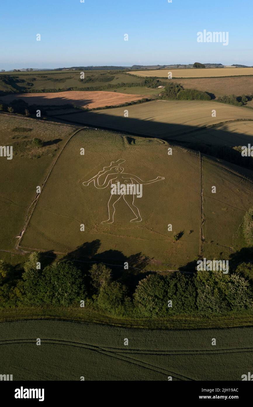 Antica figura gigante gesso su collina sopra il villaggio di Cerne Abbas , Dorset , Inghilterra Foto Stock