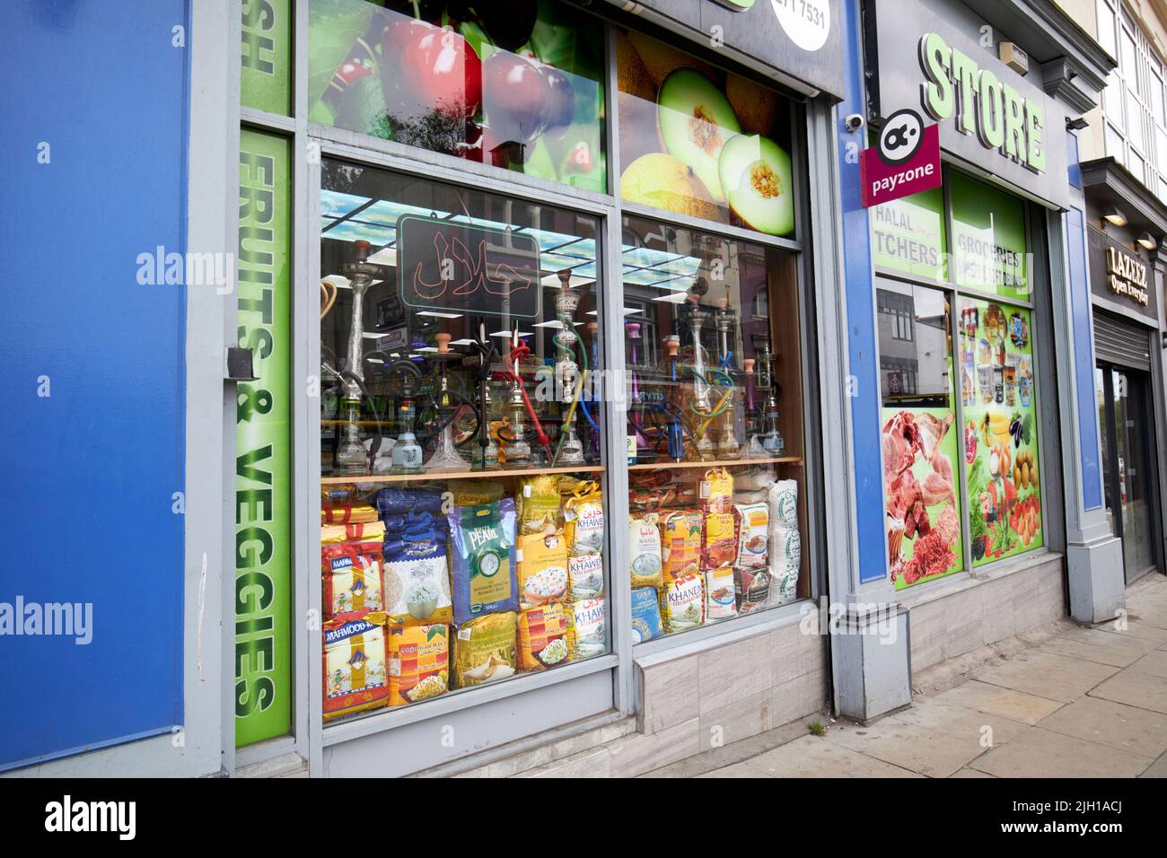 Negozi alimentari e negozi di immigrati london Road Liverpool Inghilterra UK Foto Stock