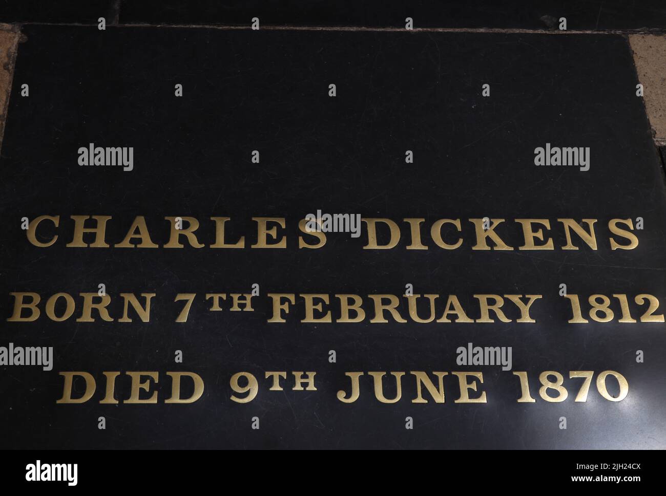 Tomba di Charles Dickens all'interno dell'Abbazia di Westminster, Londra Foto Stock