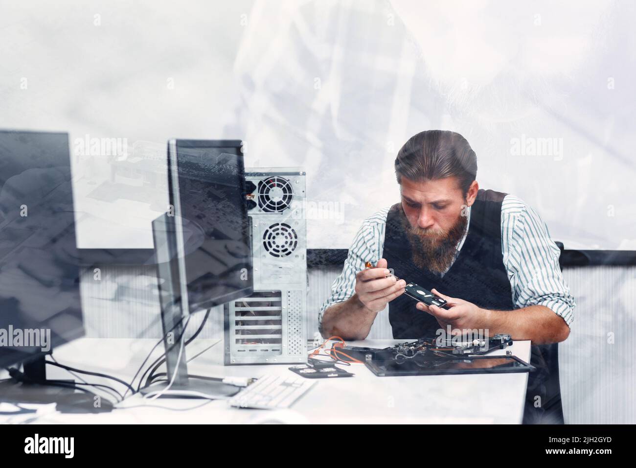 Fissaggio dei componenti dell'unità disco, doppia esposizione Foto Stock