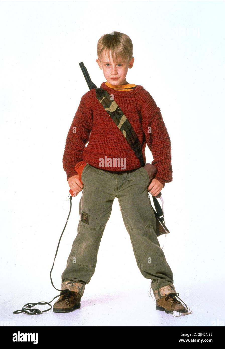 MACAULAY CULKIN, casa da soli, 1990 Foto Stock