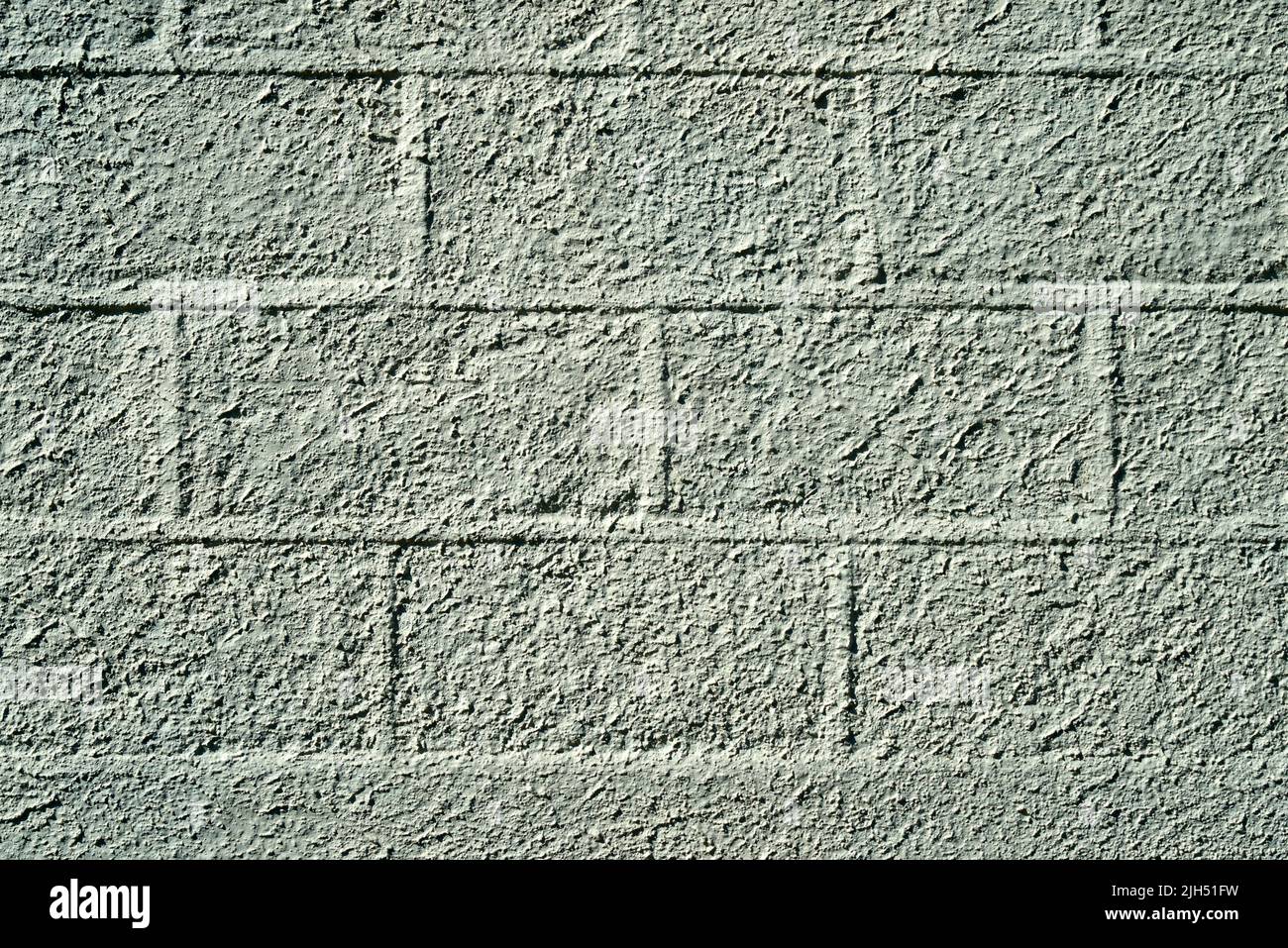 Disegno di grandi blocchi di un muro di lavoro blocco tutti dipinti lo stesso colore Foto Stock