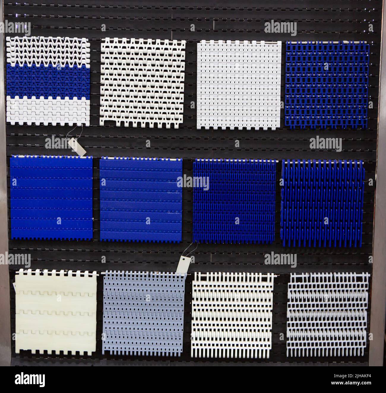 Componenti trasportatori a nastro in plastica per la linea di produzione alimentare. Foto Stock