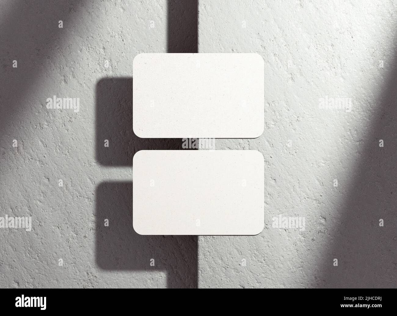 Mockup biglietti da visita con angoli arrotondati con ombre per la presentazione di branding, identità aziendale, pubblicità, cancelleria, modello di disegno grafico in f Foto Stock