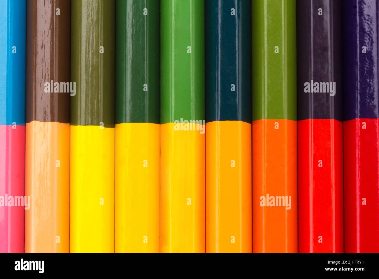 Molte matite di colore arcobaleno. Pastelli. Texture. Sfondo. Foto Stock