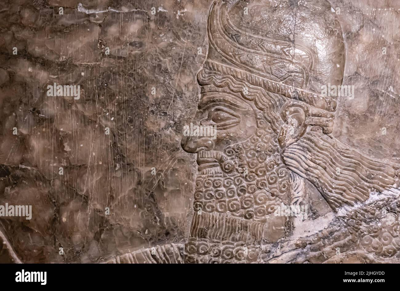 Divinità alate dall'albero sacro - dettaglio. Rilievo dal palazzo di Ashurnasirpal II a Kalhu, (Nimrud) - Alabastro - IX secolo a.C. Museo dell'Hermitage Foto Stock