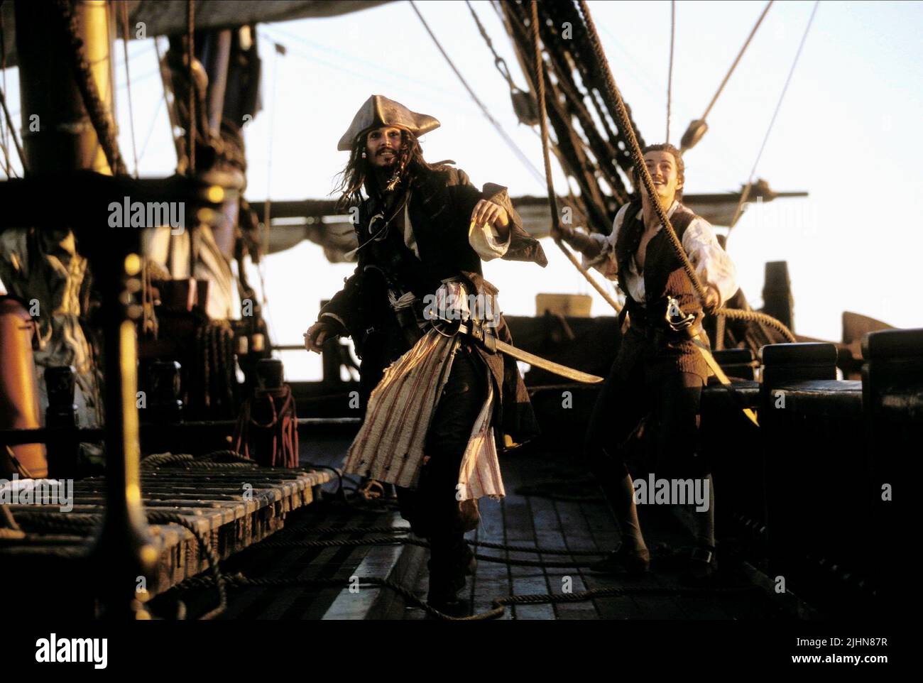 JOHNNY Depp, Orlando Bloom, pirati dei Caraibi: La maledizione della perla nera, 2003 Foto Stock