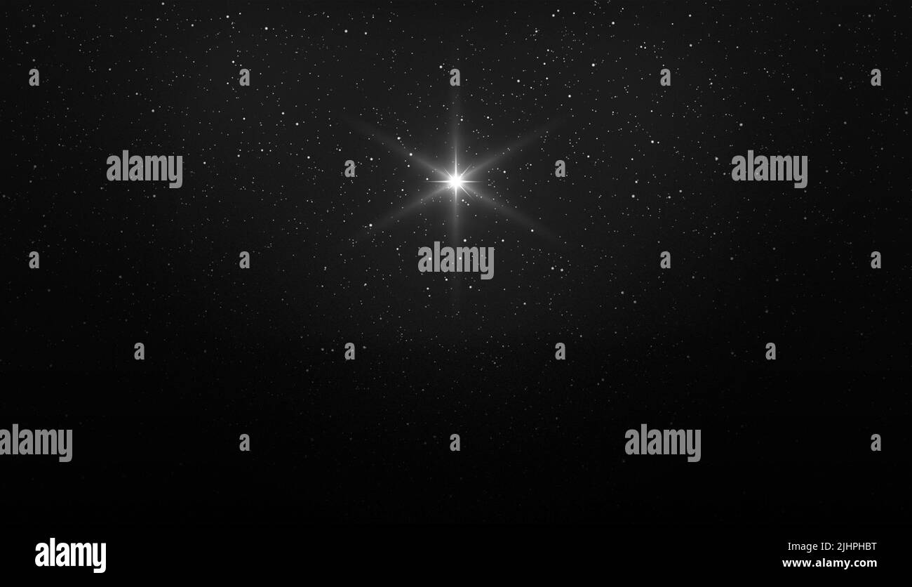 Stella luminosa sul cielo stellato notte. Bianco e nero. Stella natalizia della Natività di Betlemme, Natività di Gesù Cristo. Sfondo del bellissimo Foto Stock