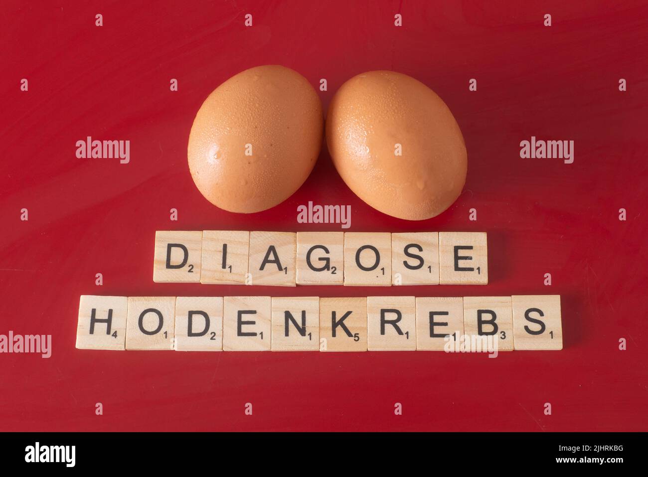 Due uova e le parole quot Diagnosi cancro testicolare quot sotto Foto Stock