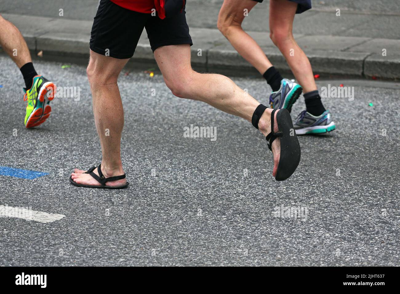 maratona running sandali su asfalto Foto Stock